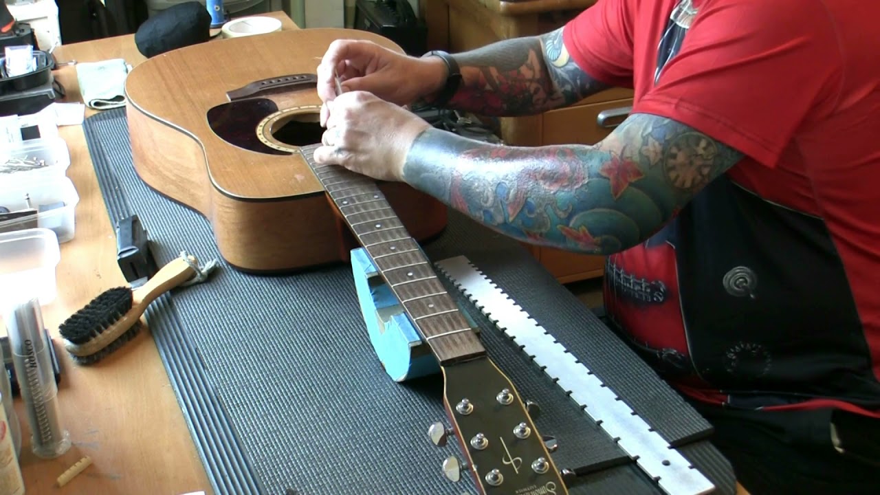 Simon and Patrick Cedar 6 (Godin / Canada) in for a fret level and a setup...