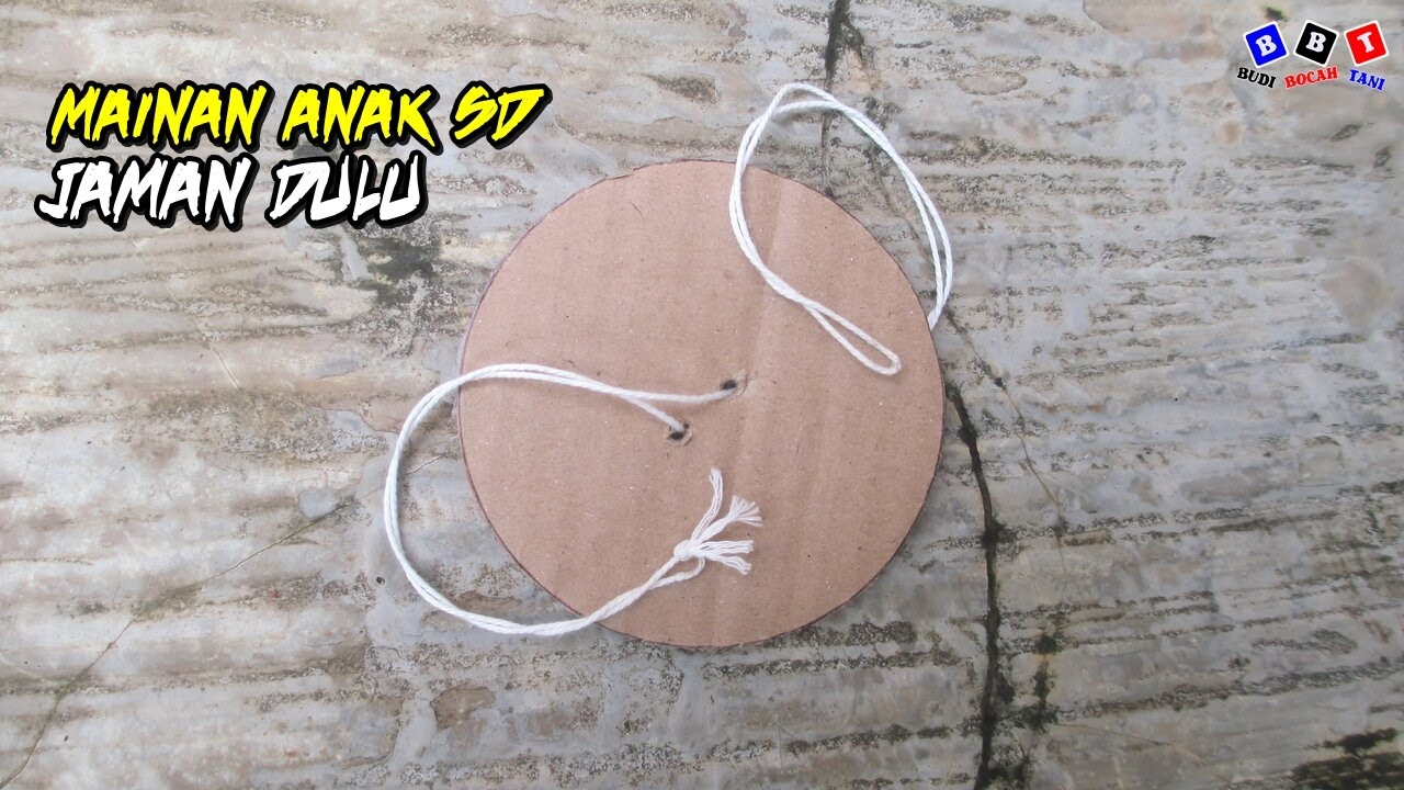 Membuat Mainan Gangsing Tarik dari kardus