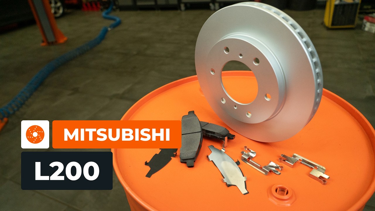 How to change the front brake discs and pads on MITSUBISHI L200 KA [AUTODOC TUTORIAL]