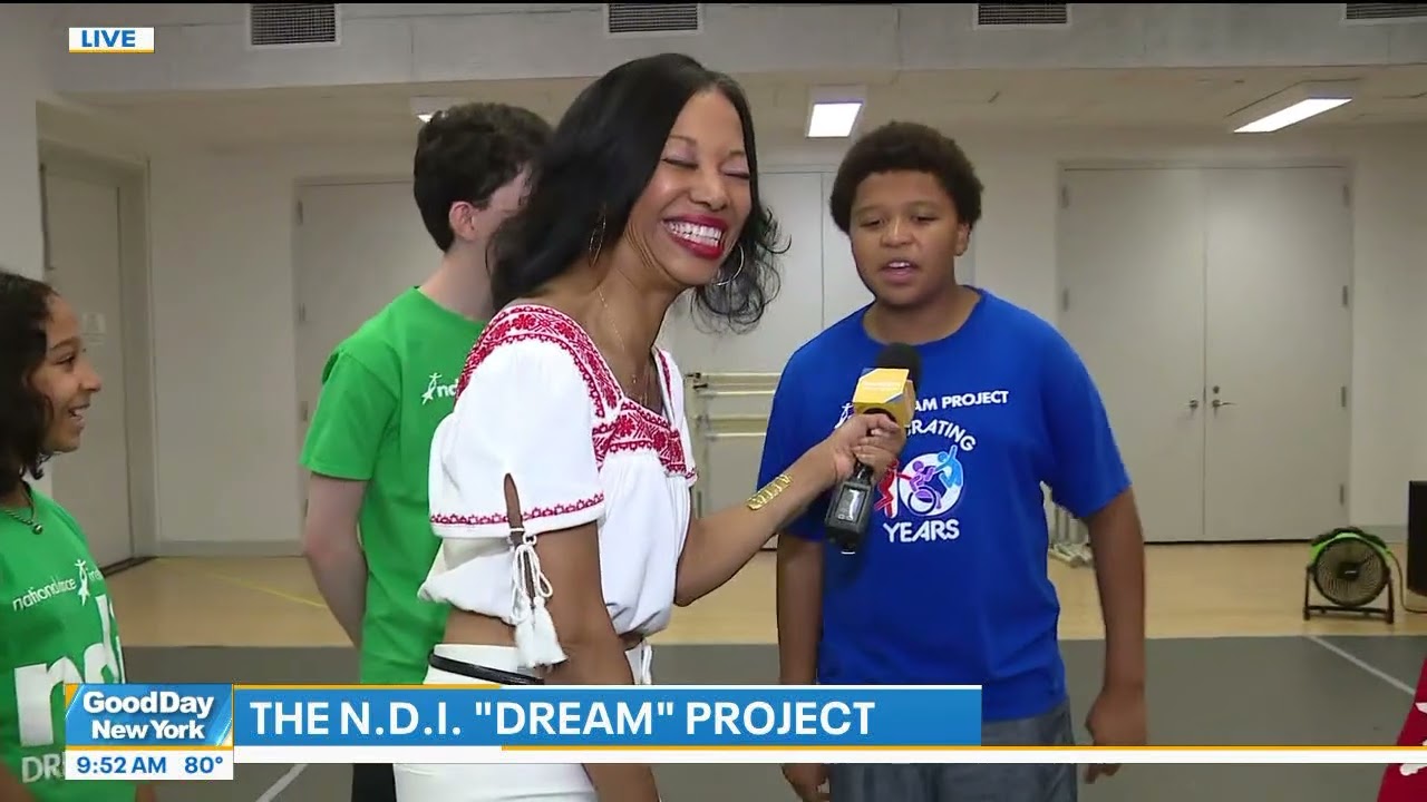 Fox 5's Christal Young with NDI DREAM Project Dancers on August 13, 2025.
