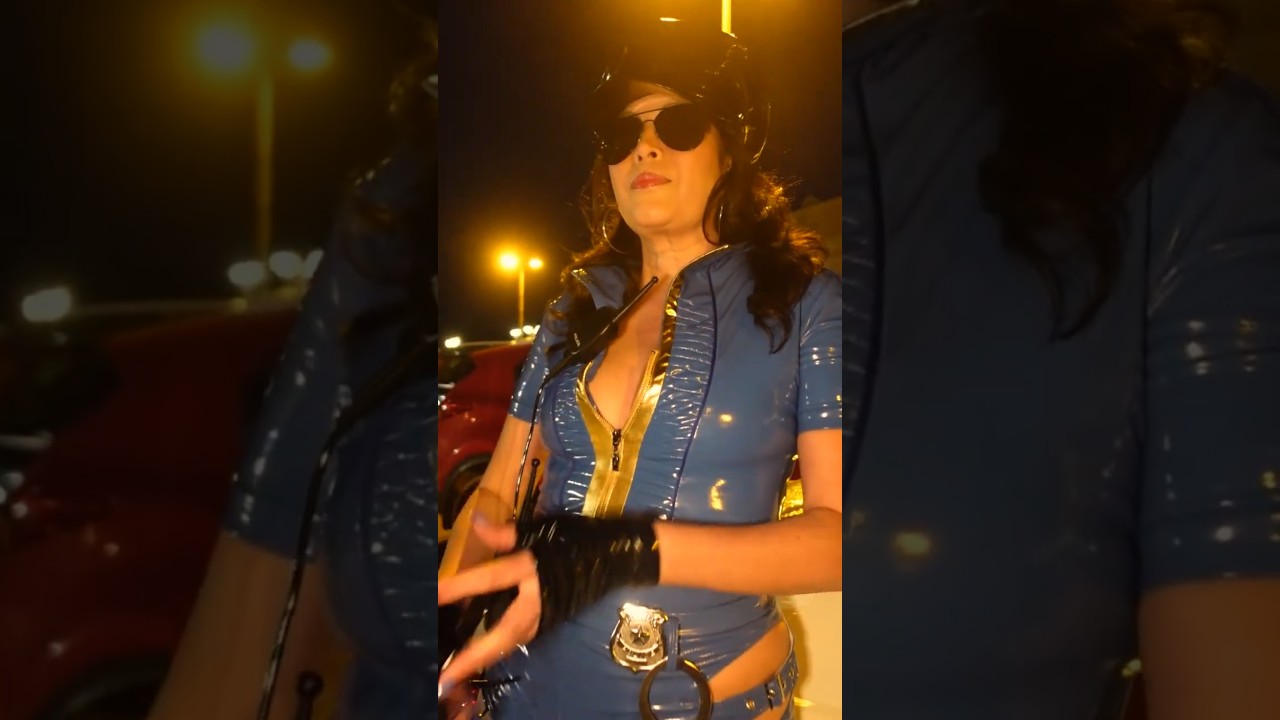 Police Woman in PVC Walking the Beat