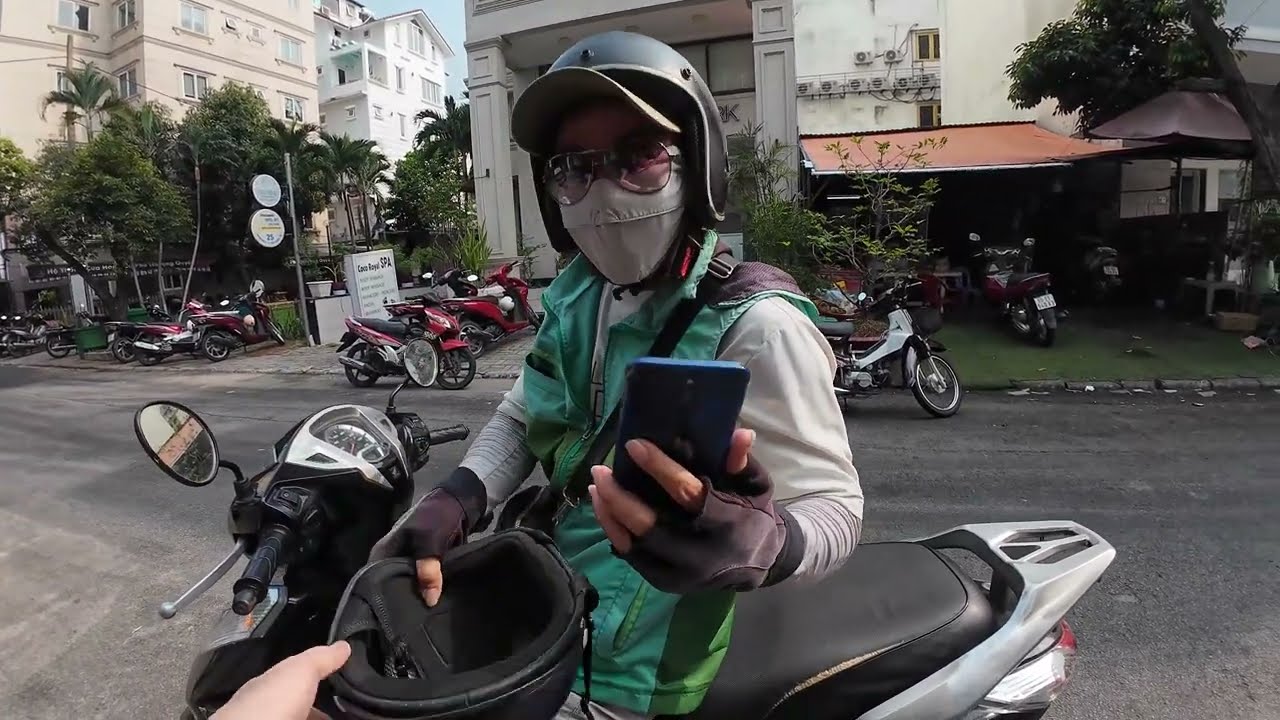 Riding Through Saigon’s Chaos – Grab Bike from District 1 to District 7