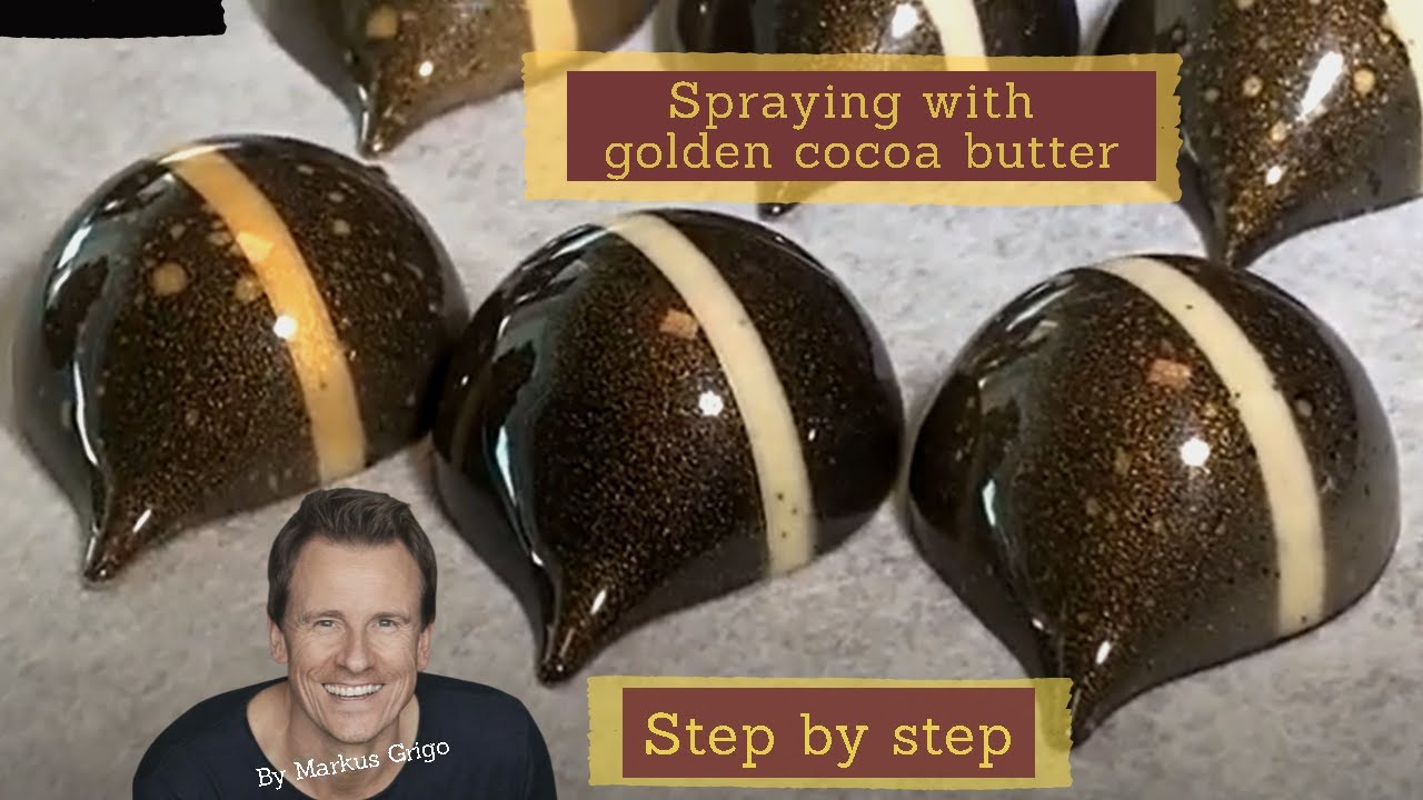 Spraying with golden cocoa butter