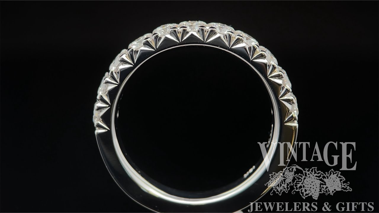 Hand making a 18k white gold French cut pave diamond ring band