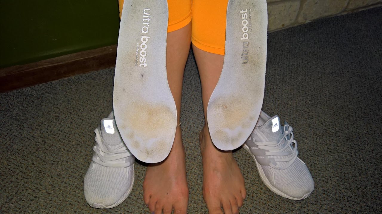 Her sockless feet - training in Adidas Ultra boost