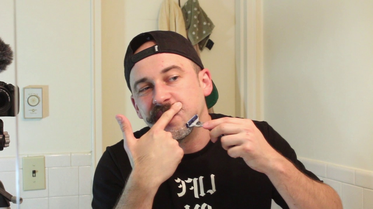 Shaving with Handlebar Mustache