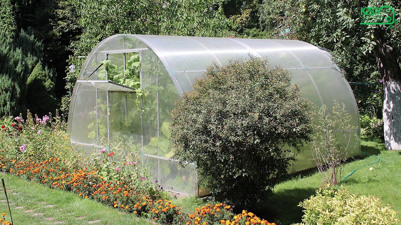 Greenlux Canada - Polycarbonate arched greenhouse.