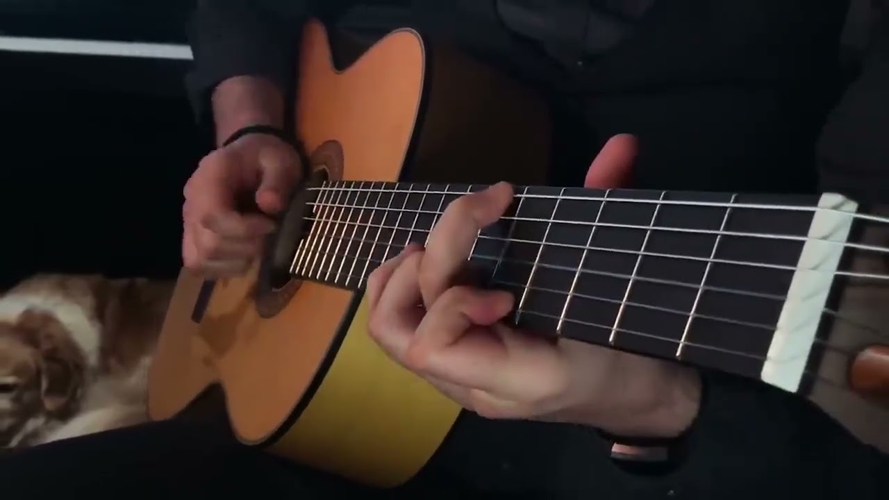 George Michael's gentle fingerstyle guitar playing