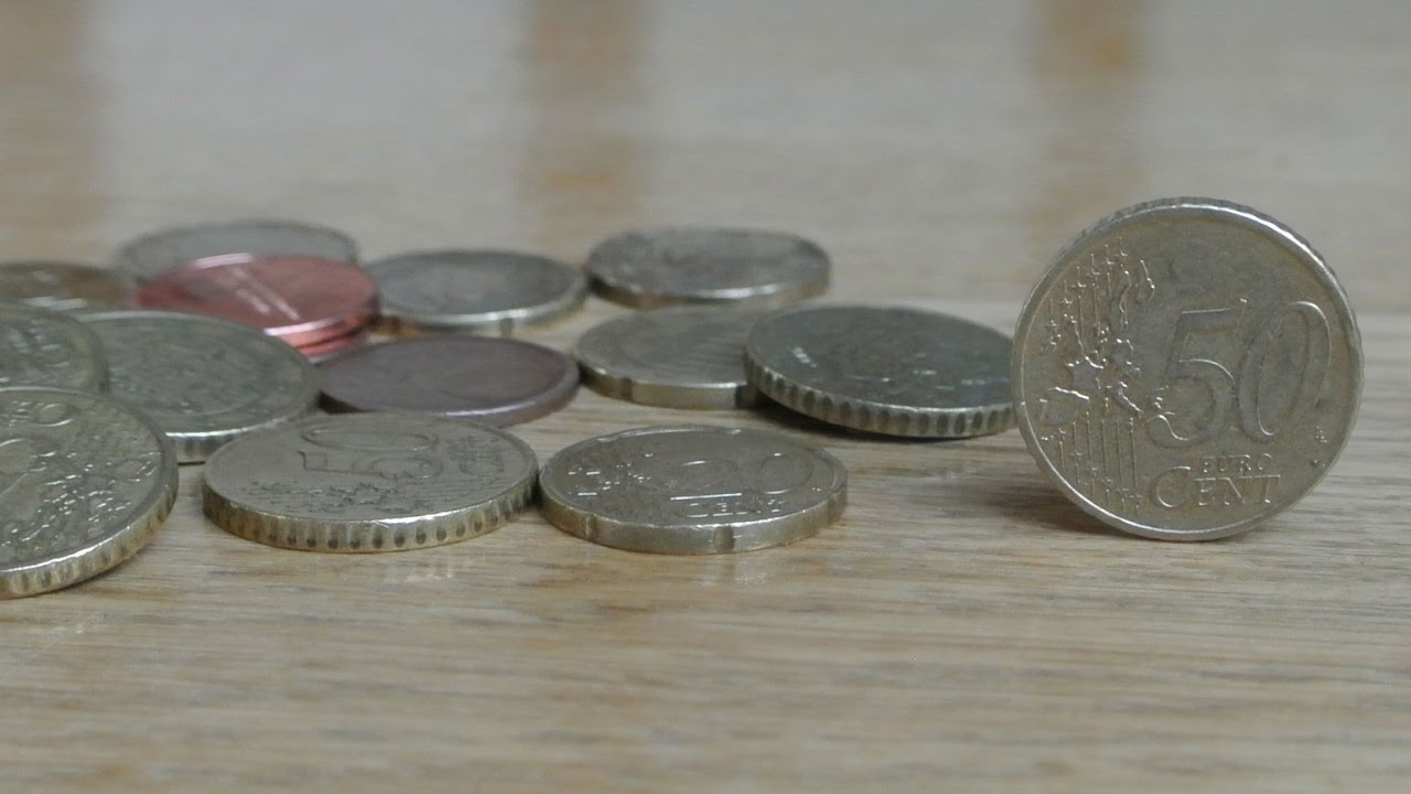 Dropping coins on a wood table stereo sound effect HQ 96kHz