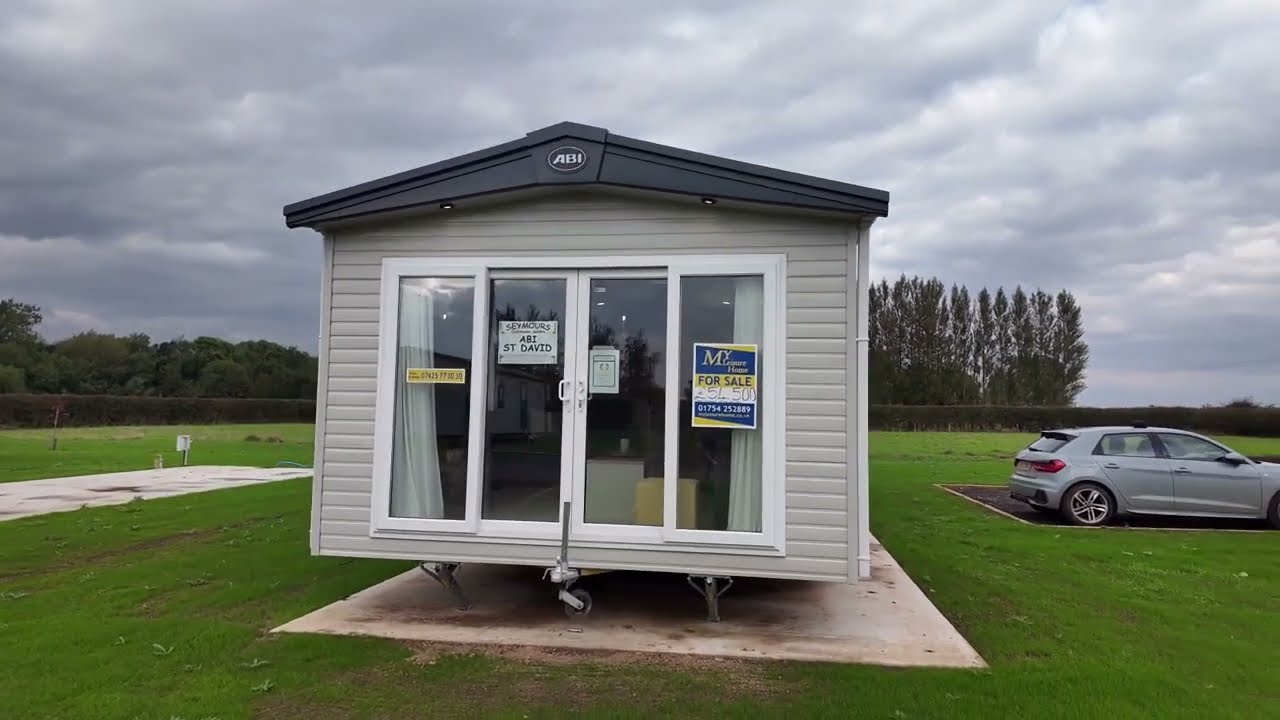 Stunning 38 x 12ft ABI St David sited on a large corner plot on a 12-Month Park with fishing lake!