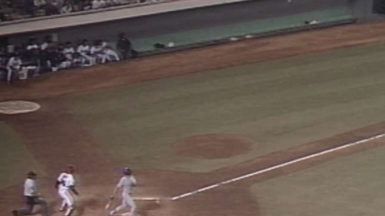 TEX@CAL: Hulse fouls four into Angels' dugout