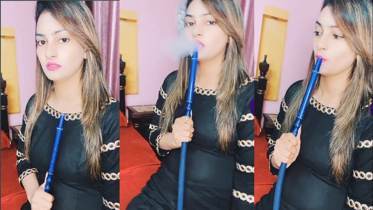 International Girl Smoking Shisha.