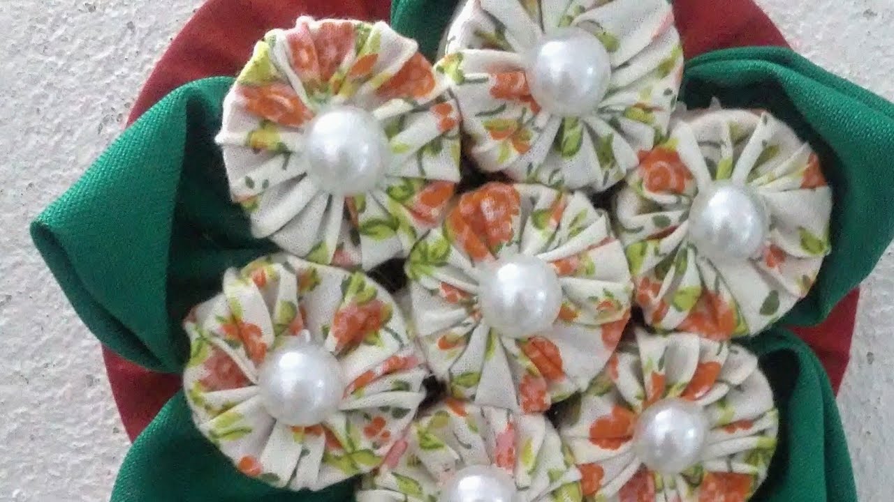 olha o gue eu fiz ! com tampinha e cd porta pano de prato# faça e venda!