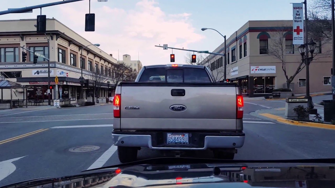 Drive from East Wenatchee  through historic downtown Wenatchee to Pybus Market.