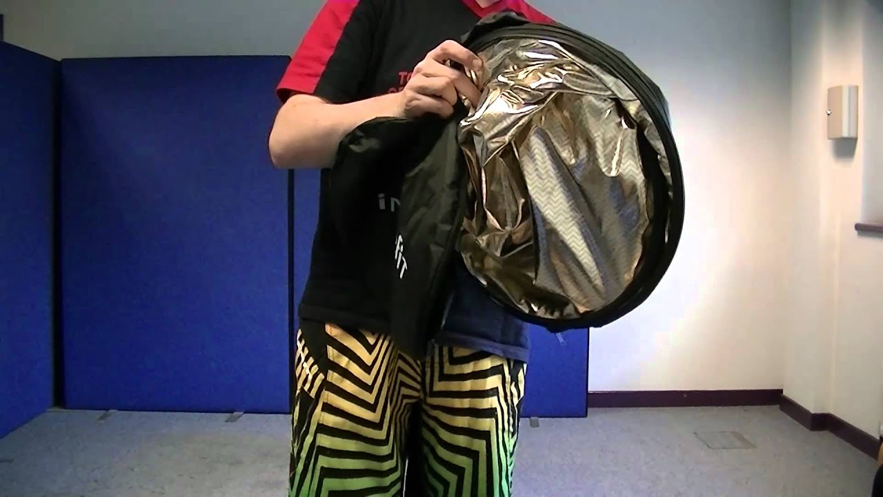 HOW TO Fold a 5 in 1 Reflector Close Up - Folded in Seconds Slow Motion