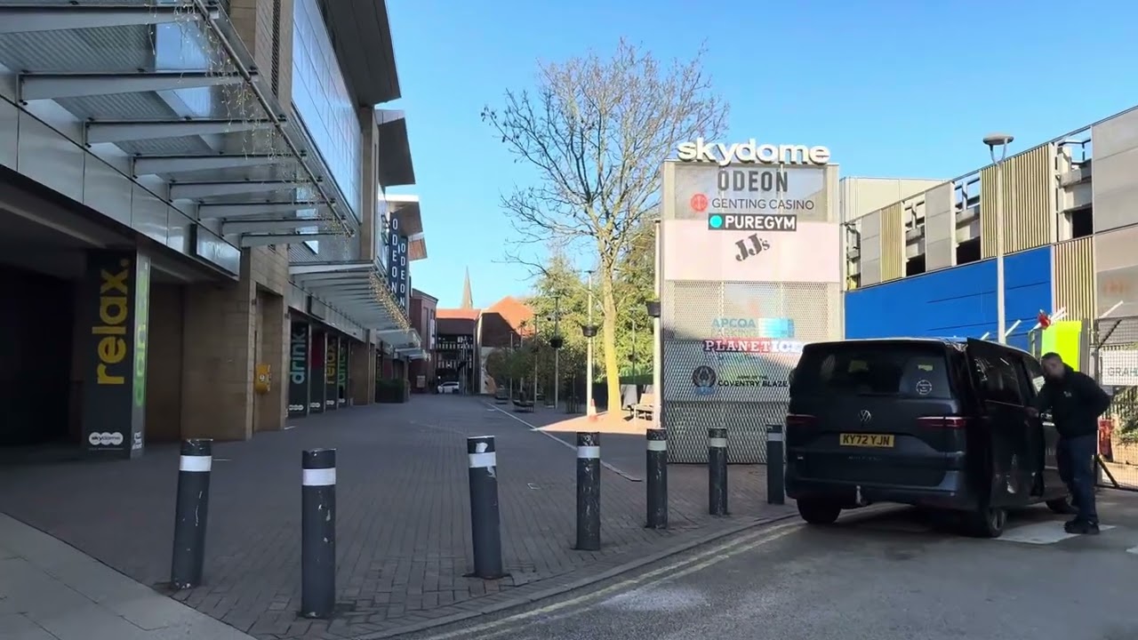 Walk from the ring road past planet ice and the sky dome to historic spon street- Coventry 