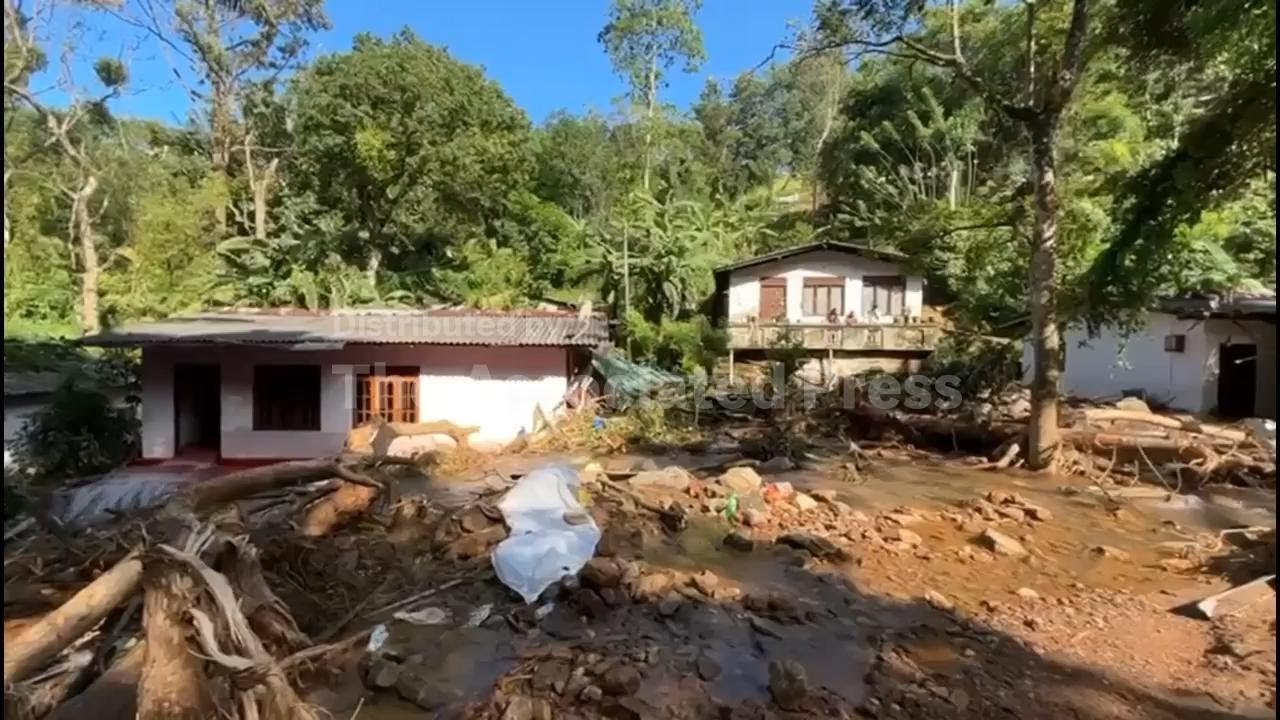 Debris strewn around in area of Kandy, Sri Lanka hit by mudslide
