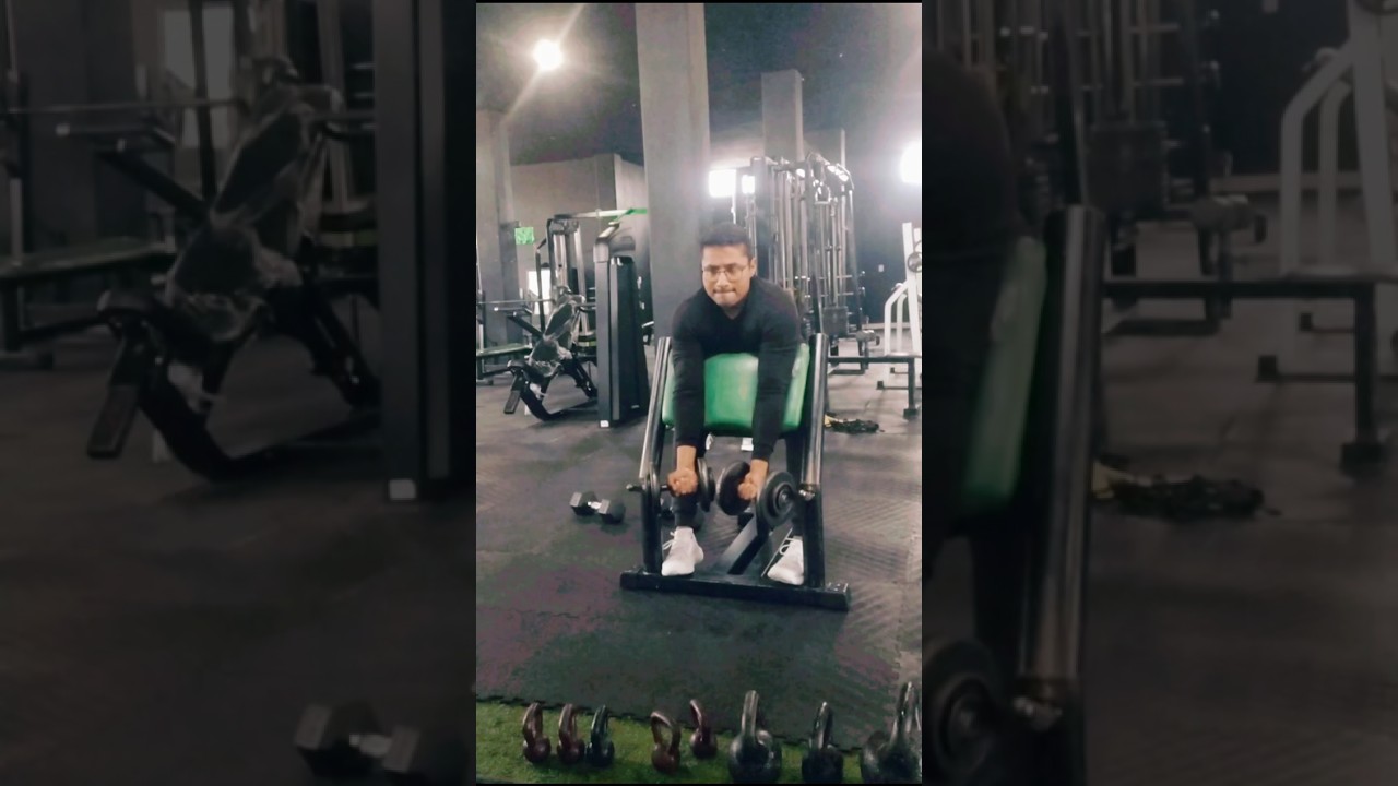 Curl bíceps dobles con mancuernas en banco predicador 