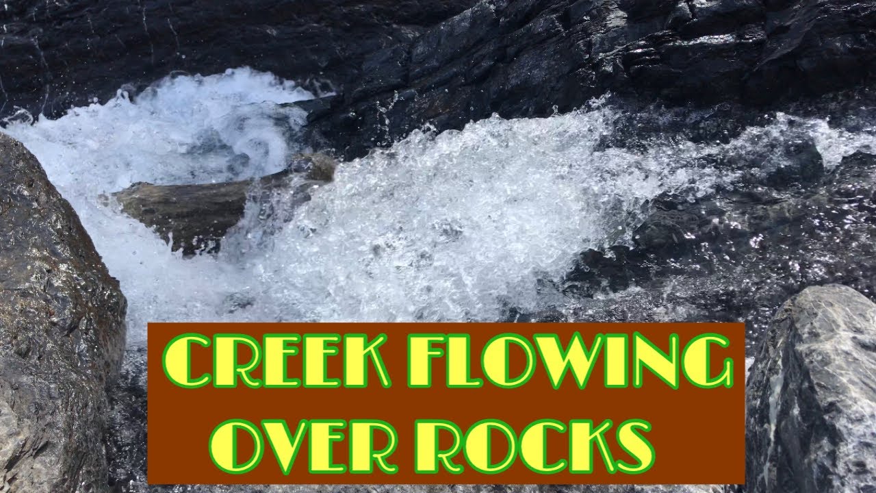 Creek Flowing Over Rocks