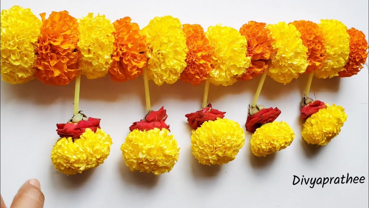 flower decoration for diwali at home/door decoration ideas/pooja room door toran/Diy marigold flower