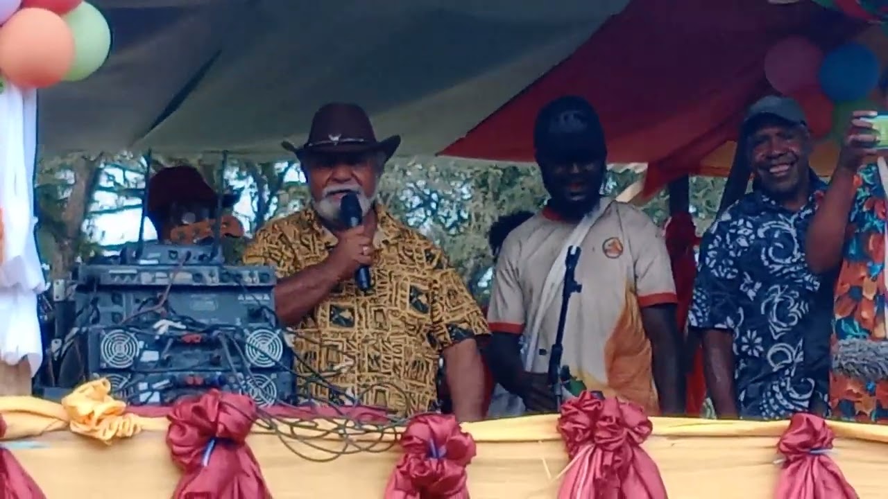 Peter Yama singing the song beautiful istap long Madang in campaign season.