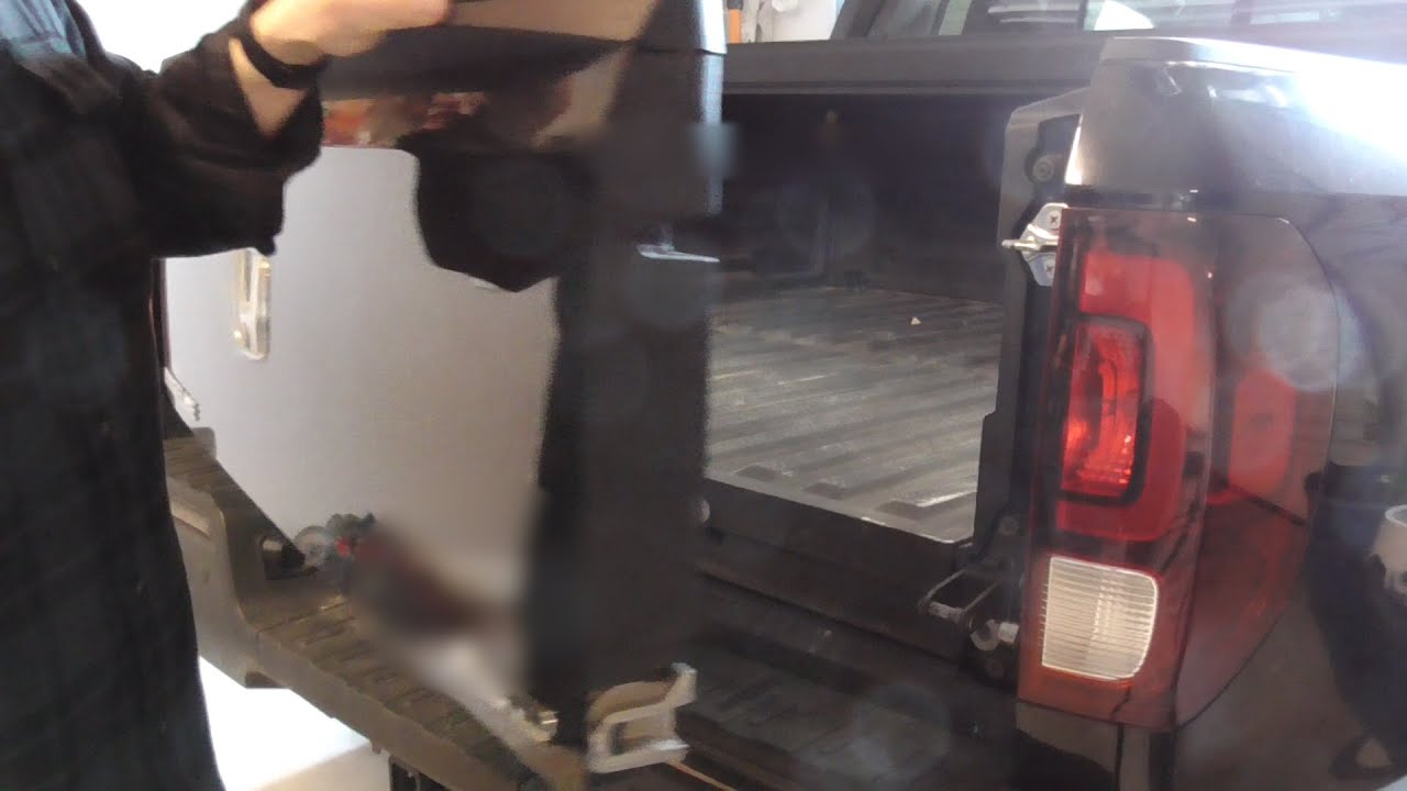 HONDA RIDGELINE TAILGATE SIDE SWING RELEASE LEVER PROBLEM.  THE FIX THAT WORKED FOR ME