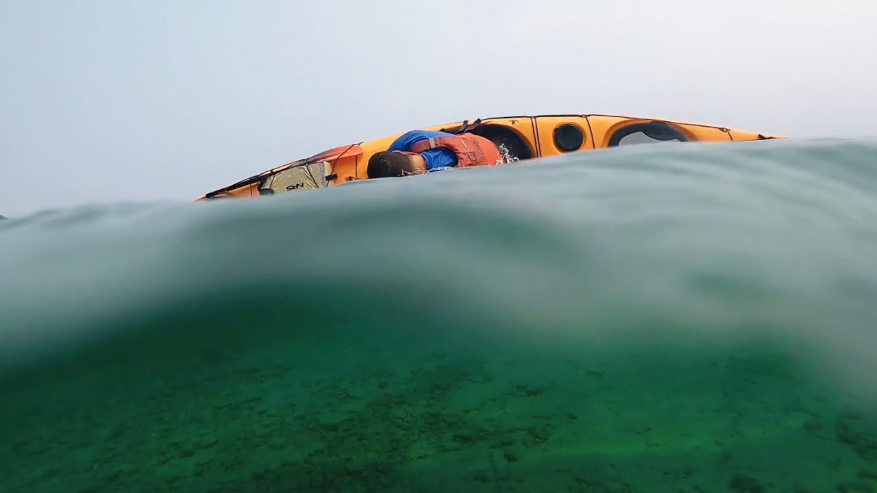 MACKINAC ISLAND/ KAYAK MAGIC KAYAK ROLL/ UNDERWATER CAMERA. GNARLY SHOT!