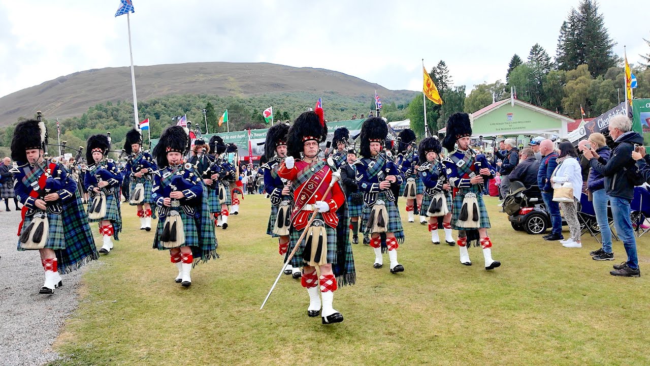 Drum Major leads Ballater Pipe Band march off playing Cabar Feidh at 2025 Braemar Gathering Scotland