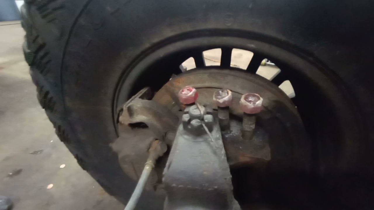 Installing 4 inch lift in my  dodge W150. lots of heat and hammering!!