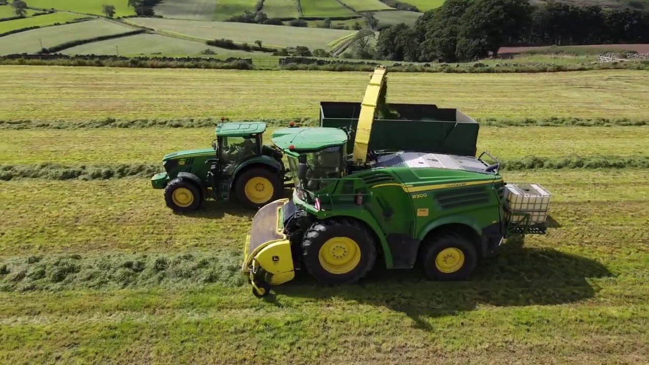 JOHN DEERE 8300 LIFTING 3RD CUT AT FARM 2