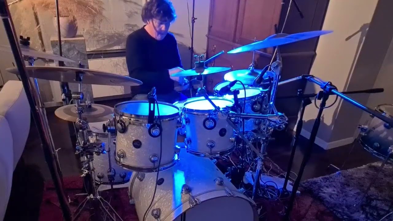 Drumming along the funk fusion in 'Money runner' by Alan Tew