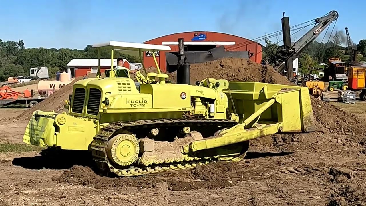 Euclid TC-12 dozer with twin Detroit 6-71 diesel engines works stockpiles for the steam shovels