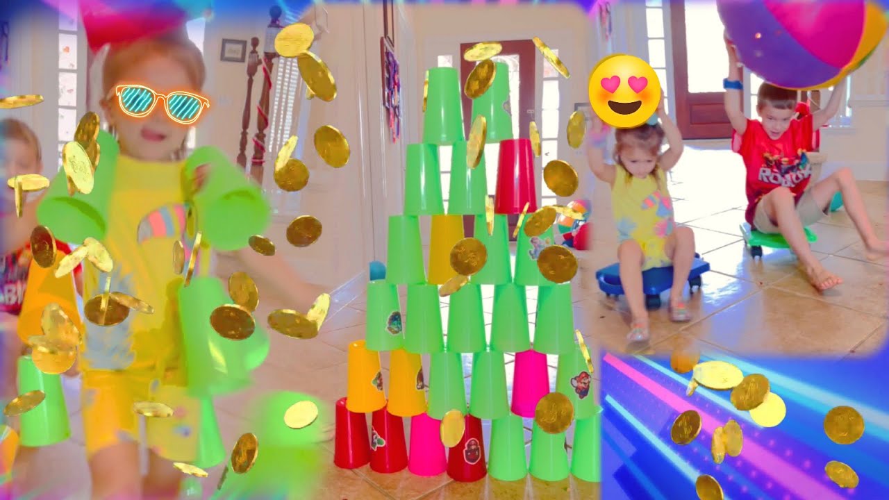 Colored cups wall challenge WITH SCOOTERS