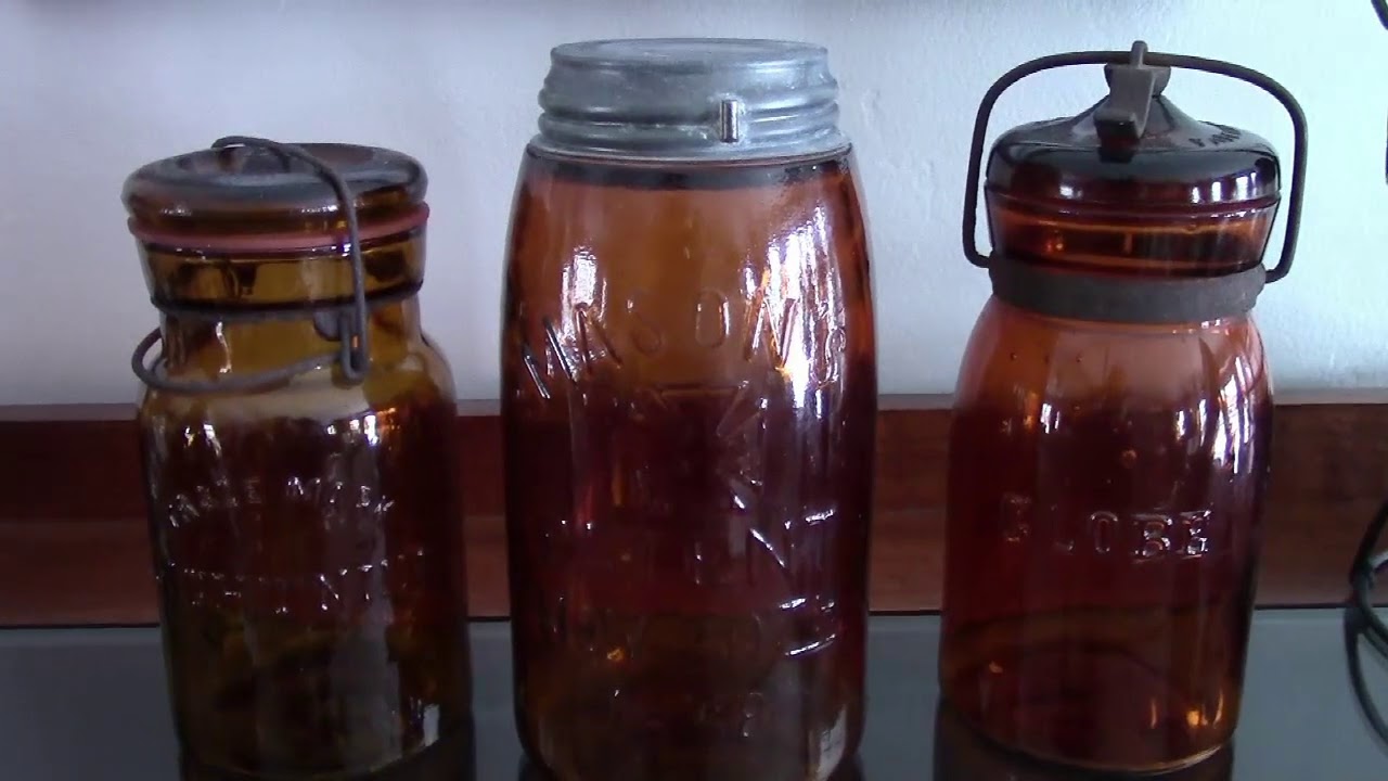 Fruit jar ID, auction tips & values.  Amber, auction, Intro Jar collecting Midget jar, lugged lid.
