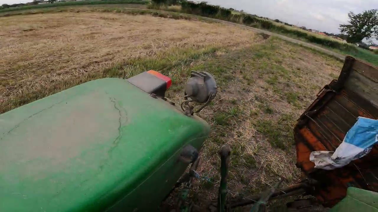 spreading manure with a john deere 2450