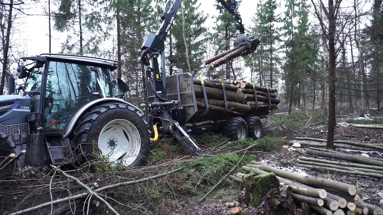 Logging  with Valtra A124 forestry tractor, trailers hydro drive work