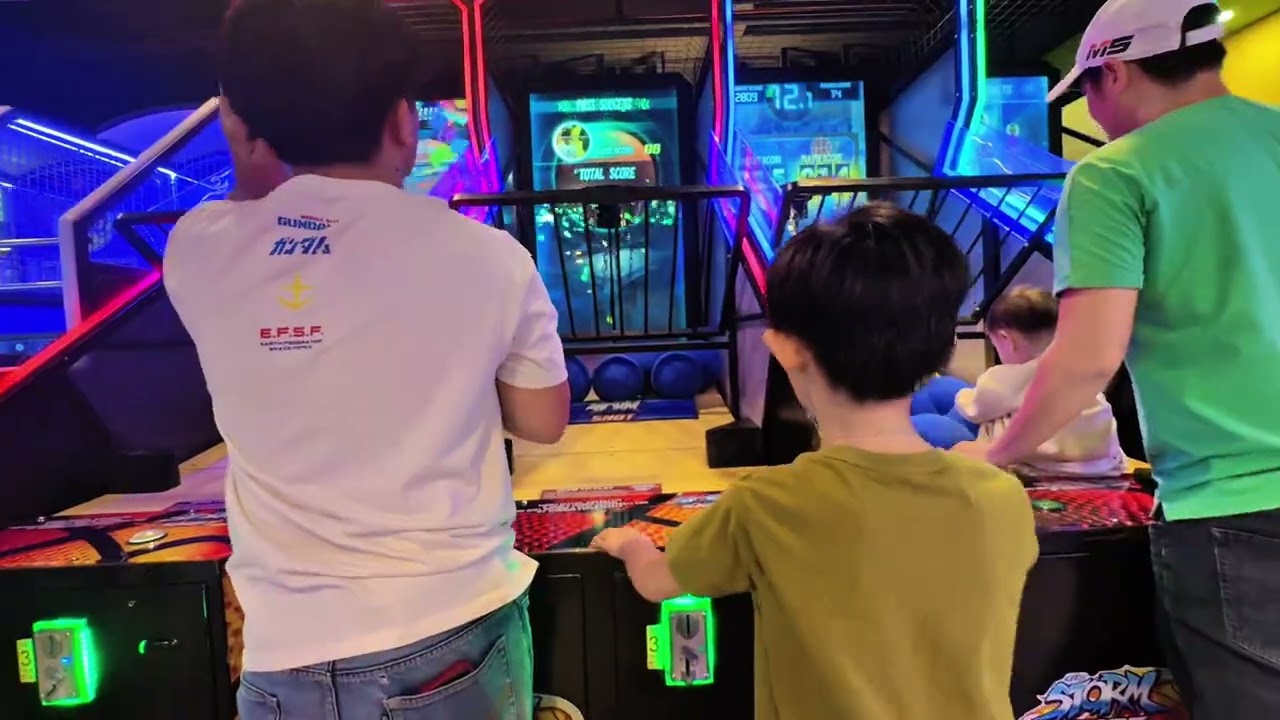 Swish! 🏀😄 Having so much fun playing basketball at the arcade—shooting hoops and enjoying the game!