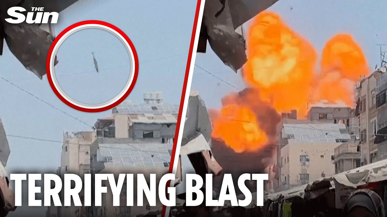 Moment Israeli airstrike takes out building in packed Gaza street in MASSIVE explosion