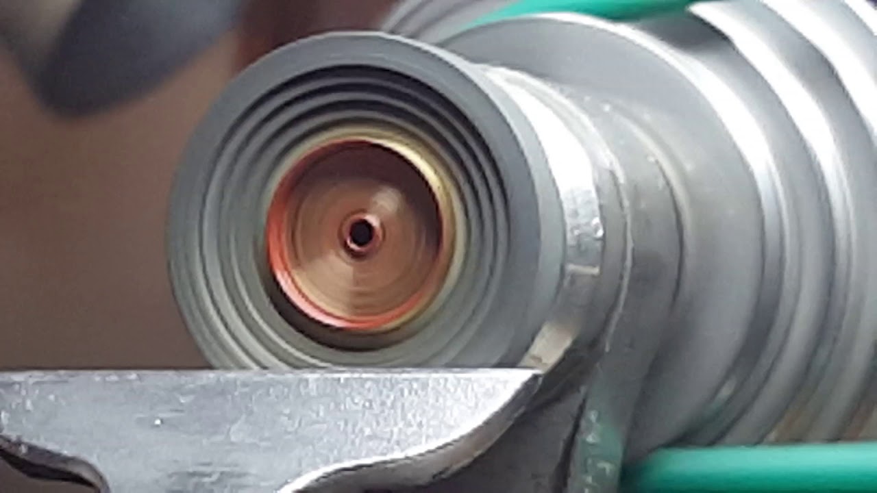 Removing scores and scratches from a watch mainspring barrel