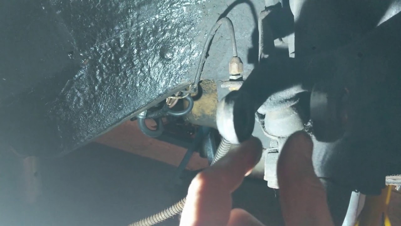 MGB GT How do I remove this stuck fulcrum bolt