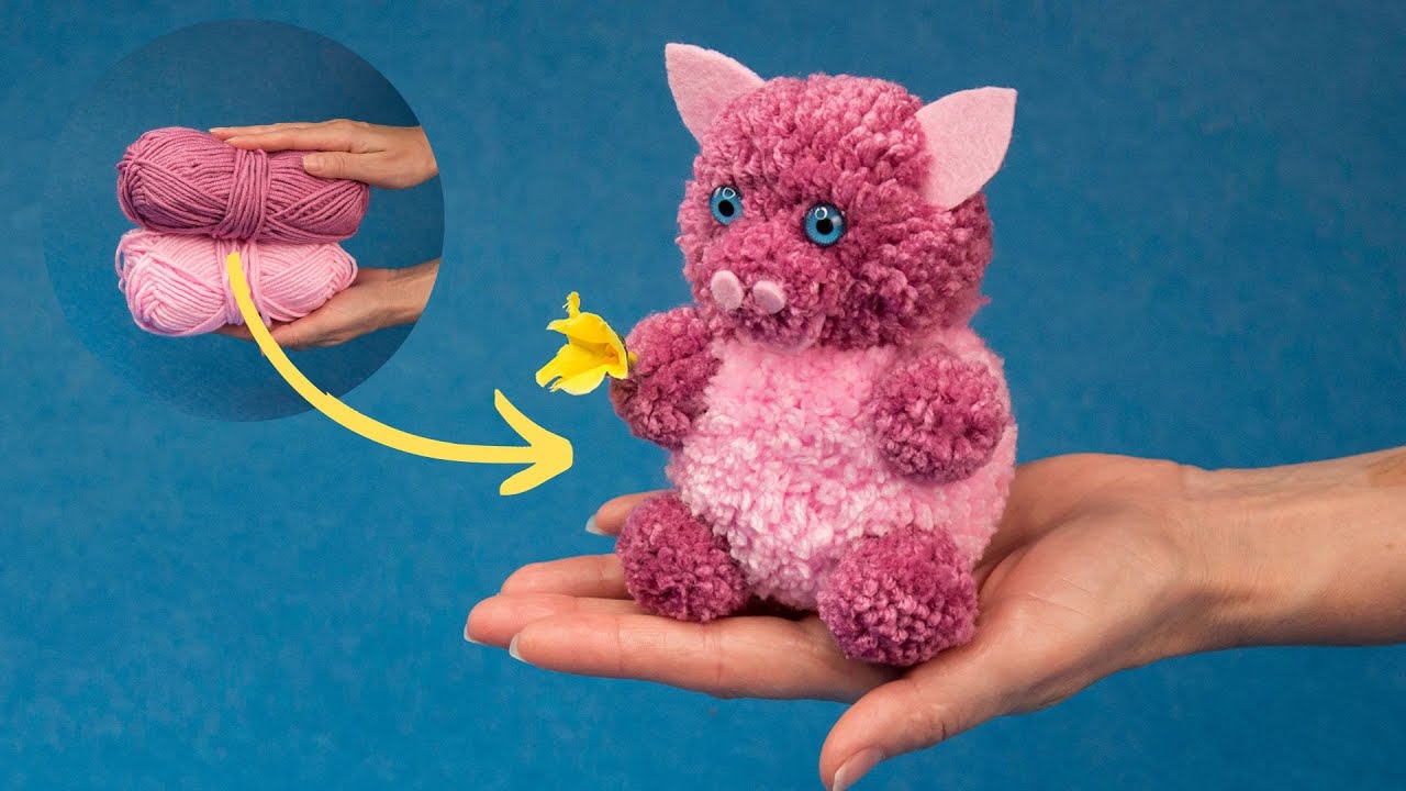 A funny piggy doll out of pompoms - quick and easy!