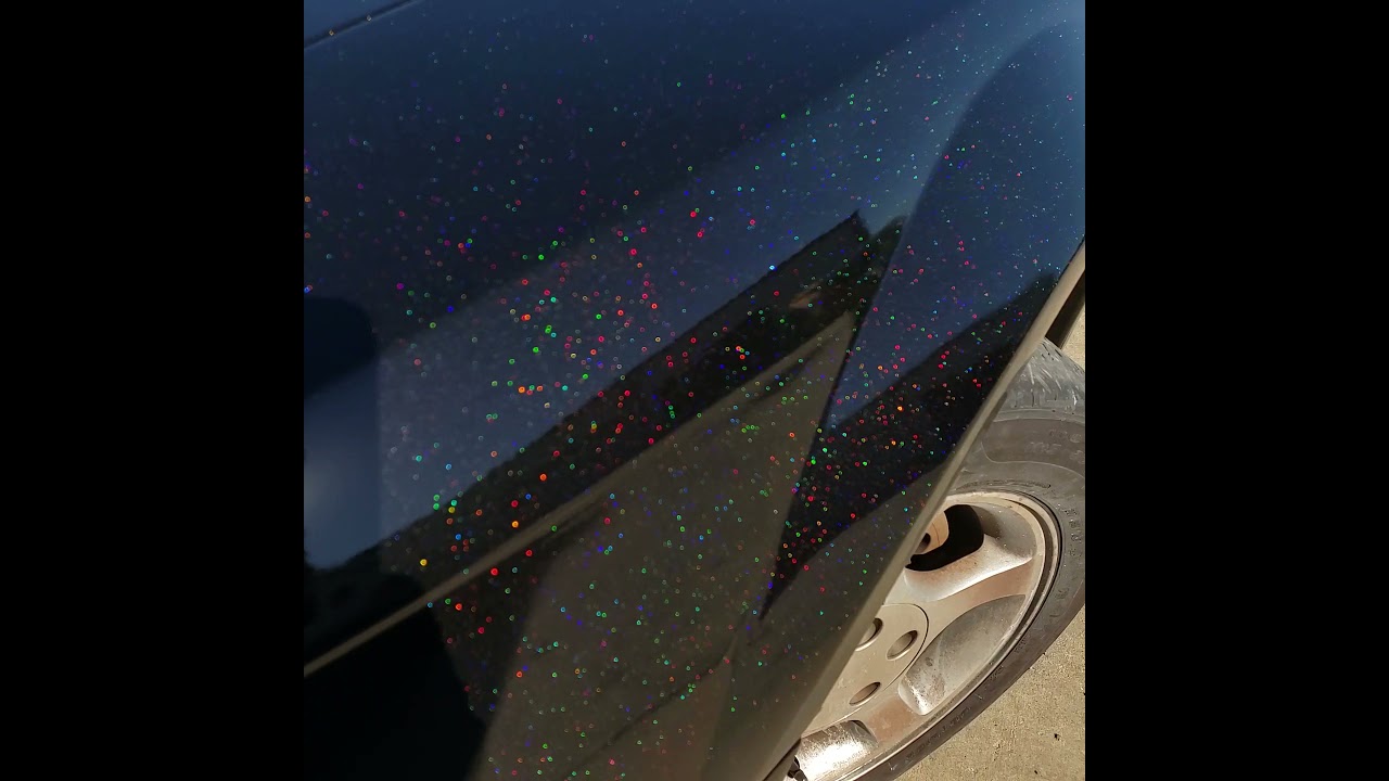 Rainbow Flake paint job on Black mustang