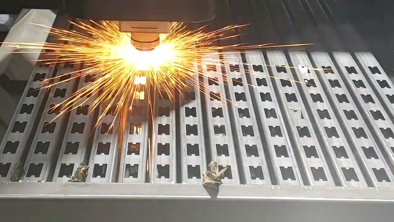 Flame cutting. A laser slices through metal.