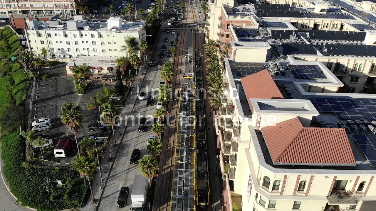 4K Lorenzo Apartments Downtown Los Angeles Metro Rail City Train Sunset Aerial