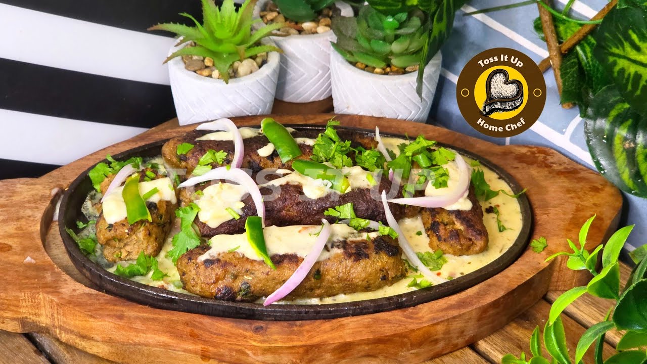 Makhmali Mutton Malayi Sizzler Seenkh Kabaab With White Creamy Gravy