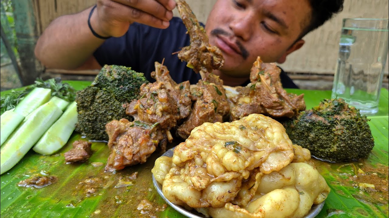 EATING SPICY MUTTON CURRY WITH RICE 