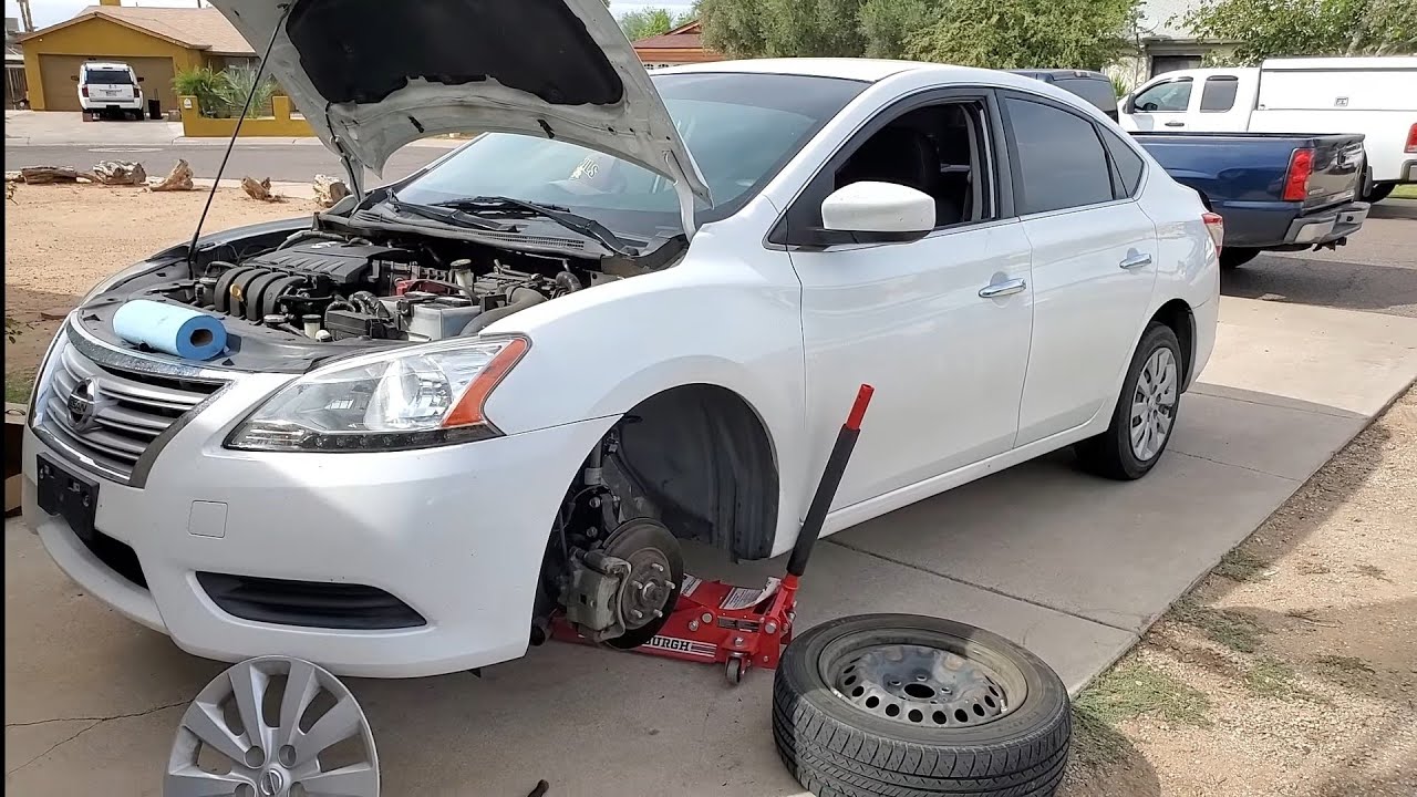 NISSAN SENTRA 2014 1.8 COMO CAMBIAR FRENOS PASTILLAS O BALATAS DE ENFRENTE