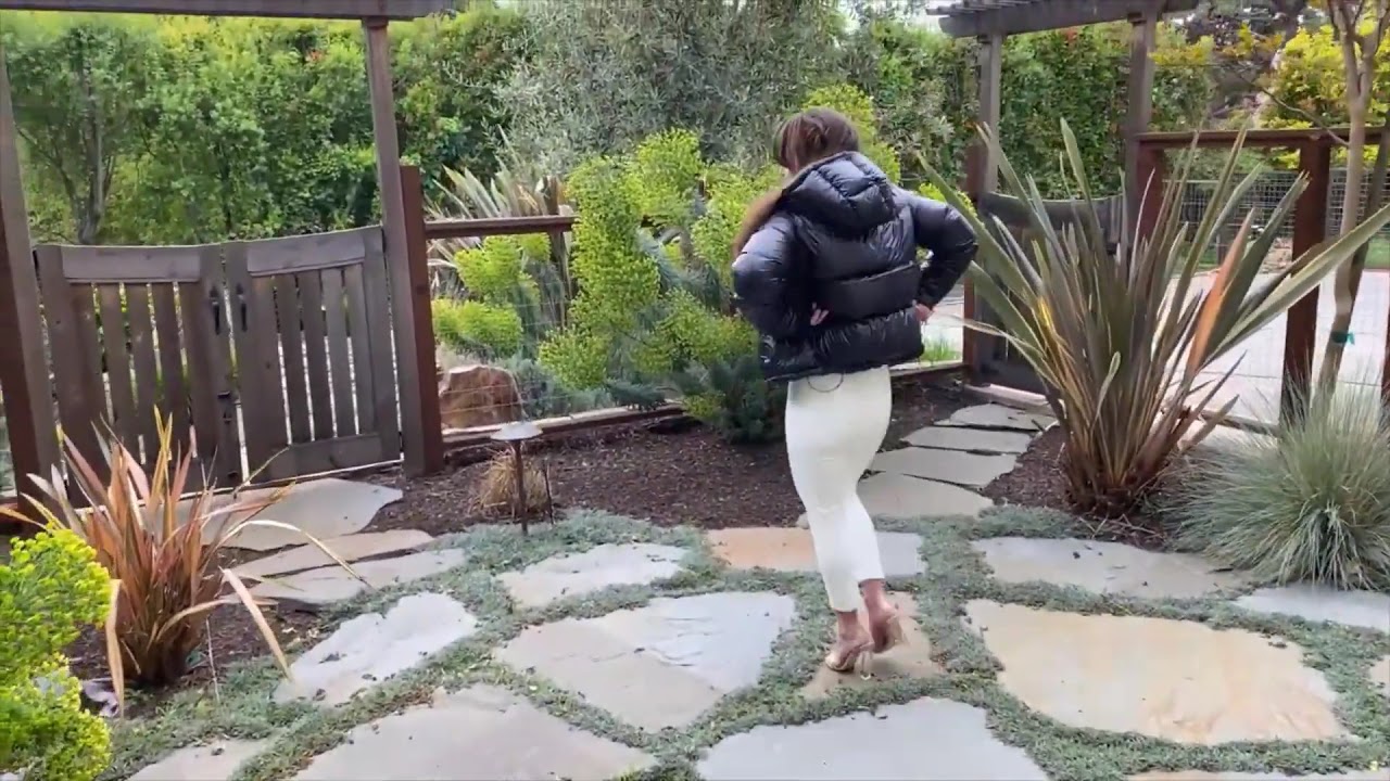 girl wearing shiny puffer jacket