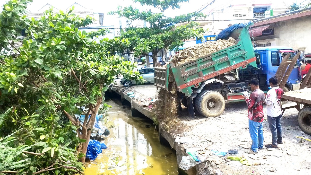 Completed Project Pushing Rocks to Remove Sewer and garbage to Prepare Land for New House