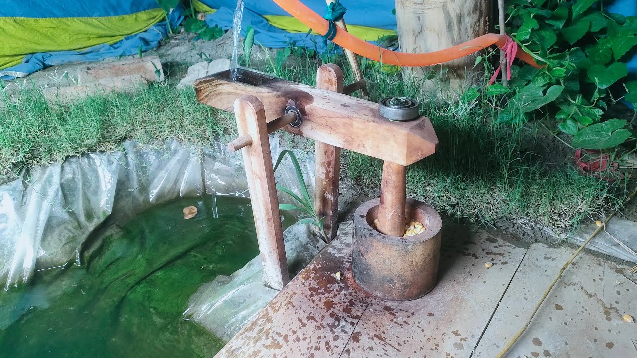 water powered pounder corn mill live